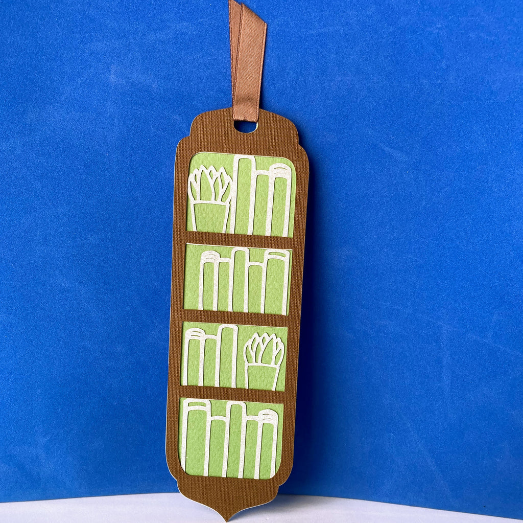 Bookmark with books - On a bookshelf